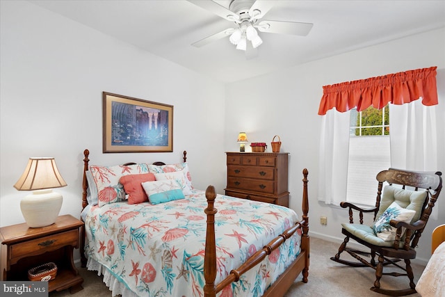 bedroom with baseboards, carpet floors, and ceiling fan