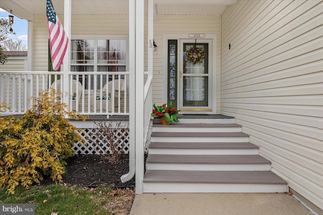 entrance to property with a porch