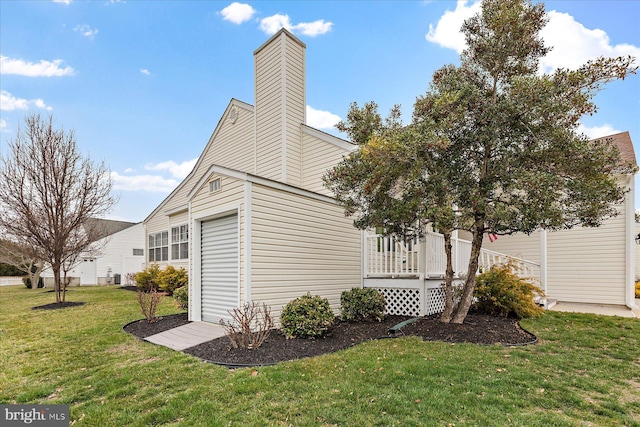 view of property exterior featuring a yard