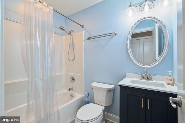 bathroom with toilet, shower / bath combo, and vanity