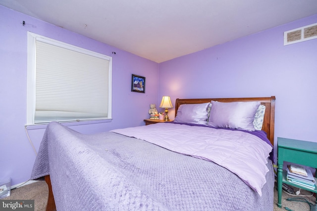 unfurnished bedroom with visible vents and carpet floors