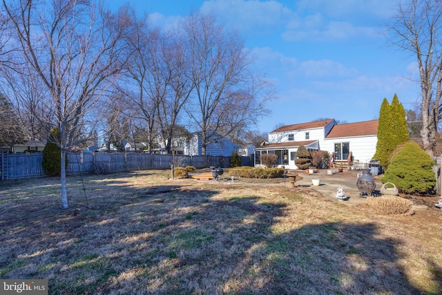 view of yard featuring fence private yard and a patio area