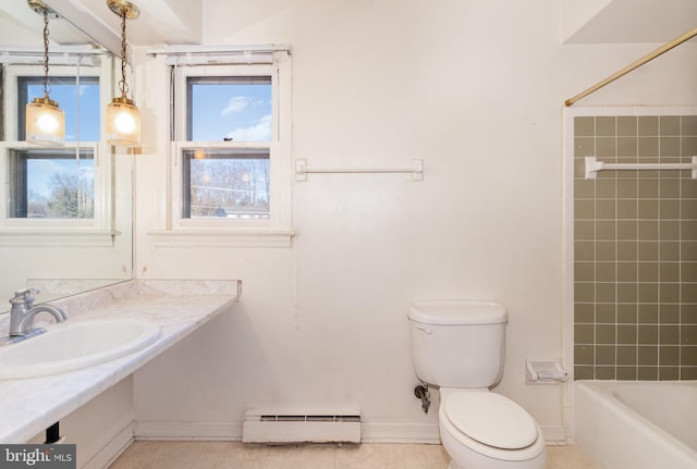 full bath featuring baseboards, a sink, tile patterned floors, toilet, and baseboard heating