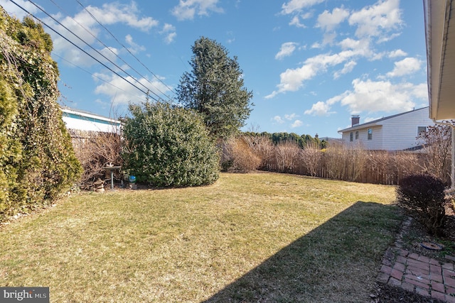 view of yard with fence