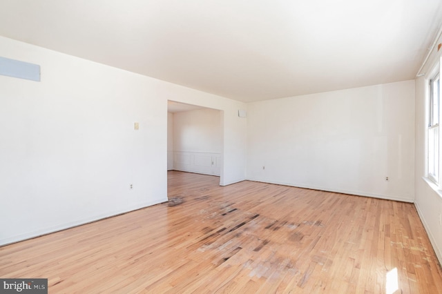 unfurnished room featuring wood finished floors