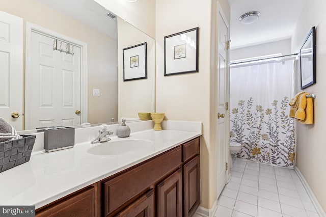 bathroom with vanity, a shower with curtain, visible vents, tile patterned flooring, and toilet