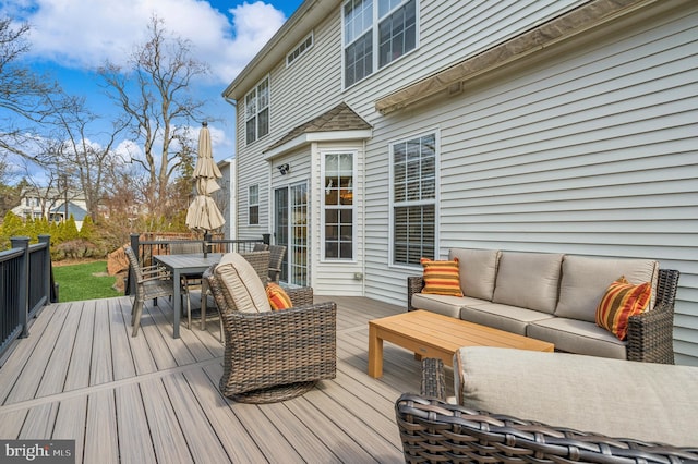 wooden deck with outdoor lounge area and outdoor dining area