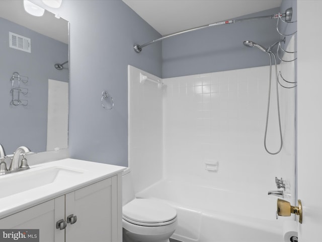 bathroom with visible vents, vanity, toilet, and shower / bathtub combination