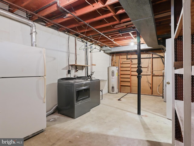 unfinished below grade area with freestanding refrigerator and electric water heater