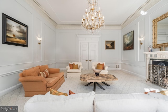 living area featuring a premium fireplace, a decorative wall, and ornamental molding