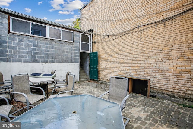 view of patio with outdoor dining space