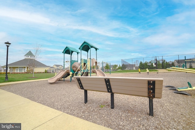 community play area featuring fence