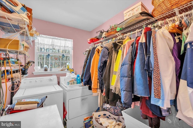 laundry room with washer and dryer and laundry area