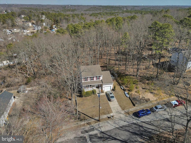 aerial view featuring a forest view