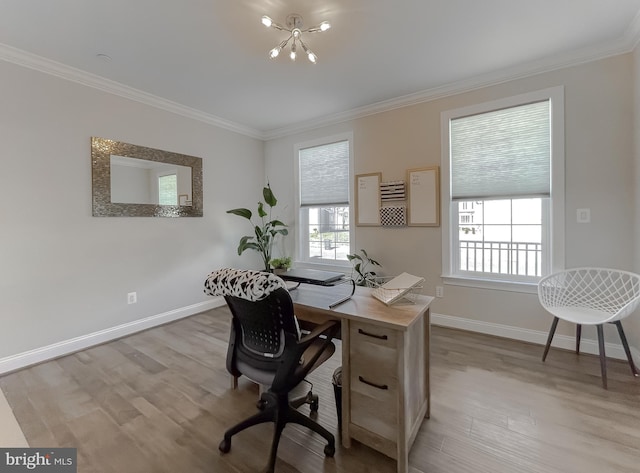 office with light wood-type flooring, baseboards, an inviting chandelier, and crown molding