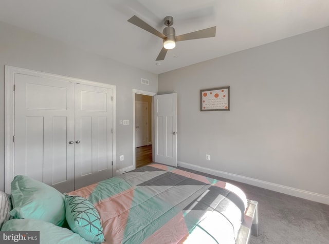 bedroom featuring a ceiling fan, baseboards, visible vents, and a closet