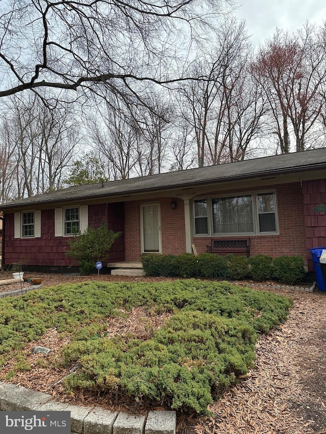 ranch-style home with brick siding