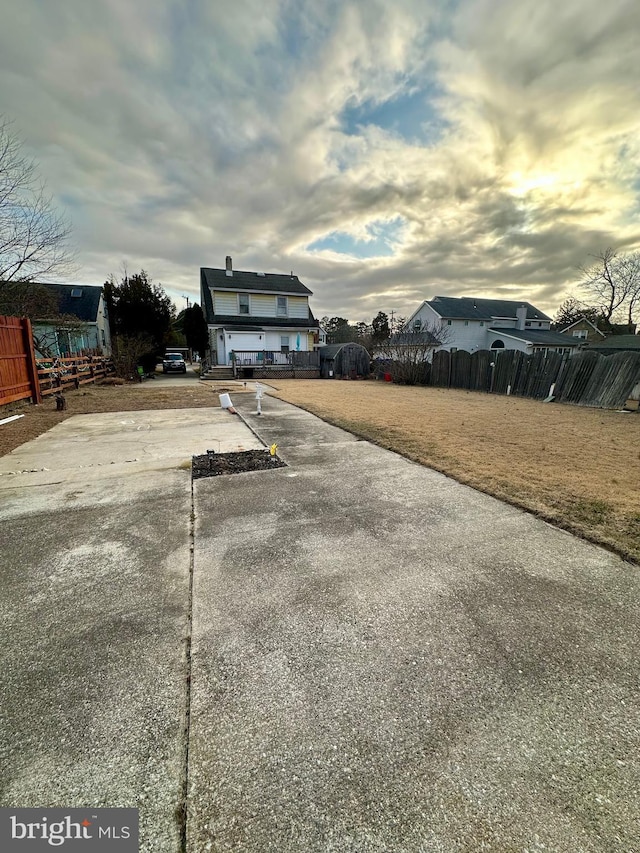 exterior space with concrete driveway