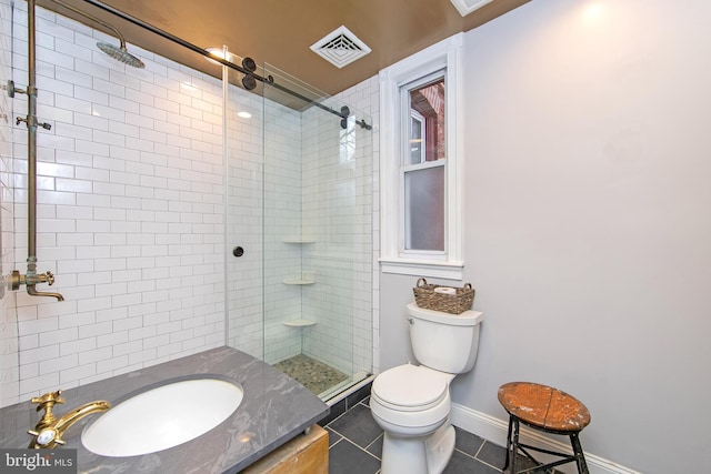 full bath featuring visible vents, baseboards, toilet, a stall shower, and tile patterned floors