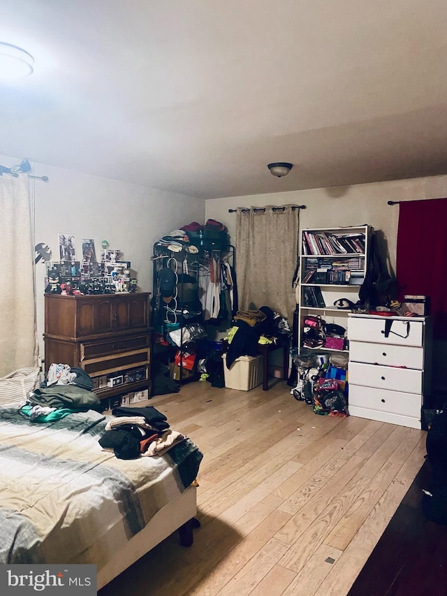 bedroom featuring hardwood / wood-style floors