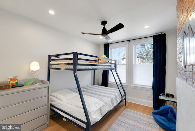 bedroom with recessed lighting, baseboards, light wood-style floors, and a ceiling fan