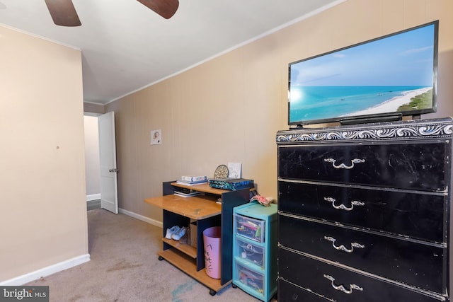 rec room with crown molding, a ceiling fan, baseboards, and carpet floors