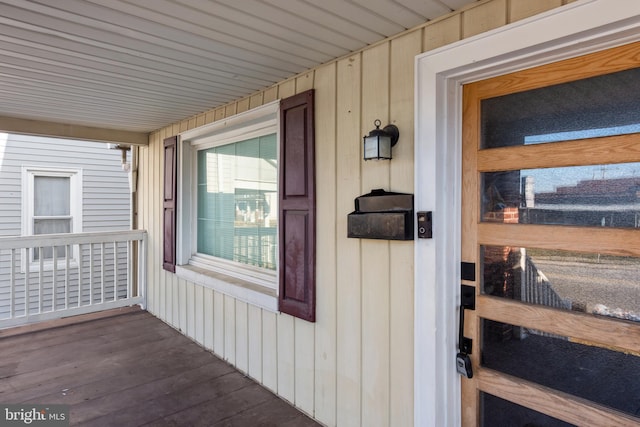 doorway to property with a porch