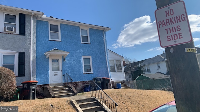 view of front of property featuring stucco siding