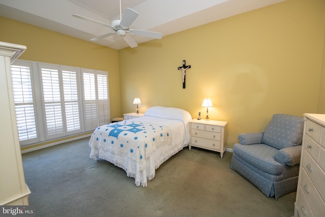 bedroom with carpet flooring, a ceiling fan, and baseboards