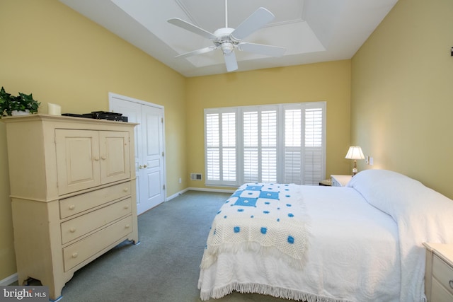 bedroom with baseboards, carpet, and a ceiling fan