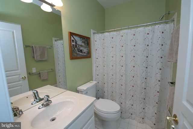 bathroom with tile patterned floors, a shower with curtain, toilet, and vanity