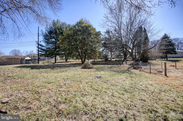 view of yard with fence