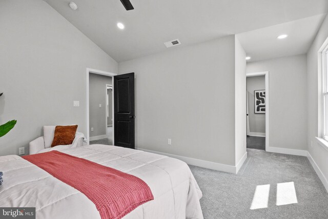 carpeted bedroom featuring visible vents, baseboards, lofted ceiling, recessed lighting, and a ceiling fan