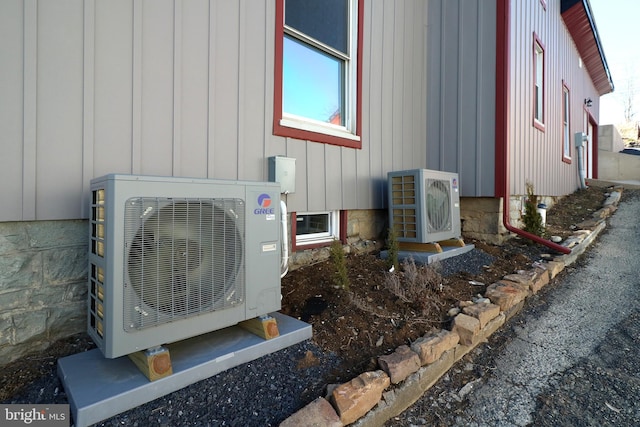 details with ac unit and board and batten siding