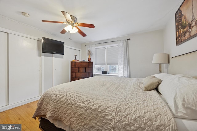 bedroom featuring a ceiling fan and light wood-style floors