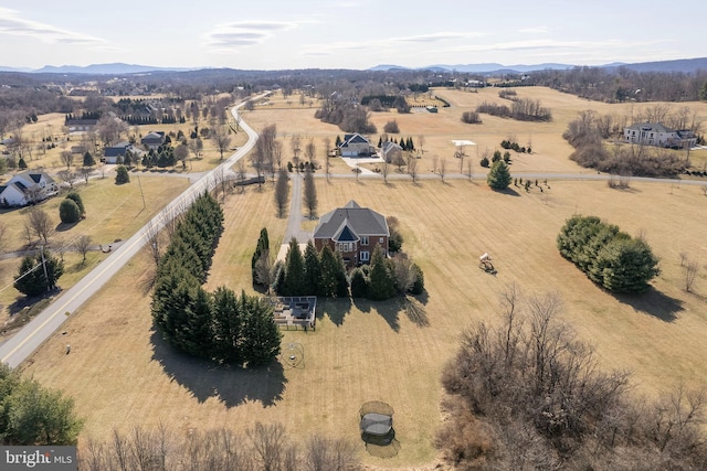 bird's eye view with a rural view and a mountain view