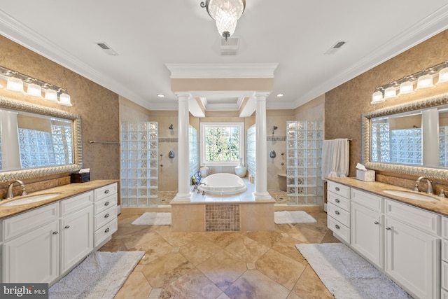 full bath with ornamental molding, ornate columns, and a sink