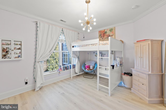 bedroom with baseboards, visible vents, an inviting chandelier, light wood-style flooring, and crown molding