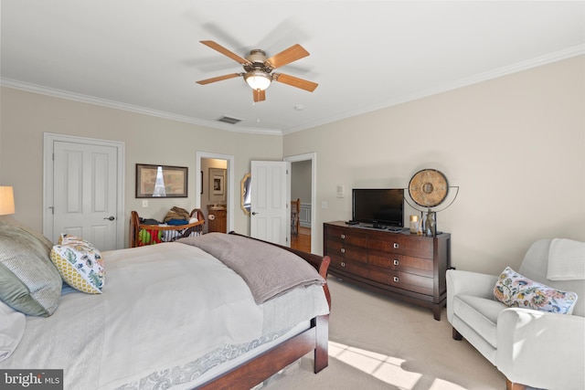 bedroom with visible vents, light carpet, ornamental molding, and a ceiling fan