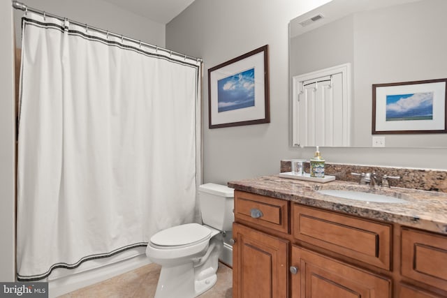 full bath featuring vanity, a shower with shower curtain, visible vents, tile patterned floors, and toilet