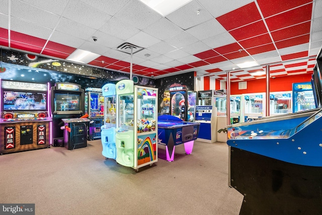 rec room featuring visible vents, carpet flooring, and a drop ceiling