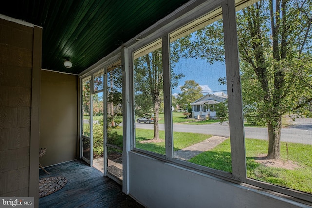 doorway to outside featuring wood finished floors