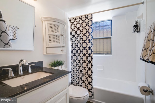 full bathroom with toilet, shower / bath combo, and vanity