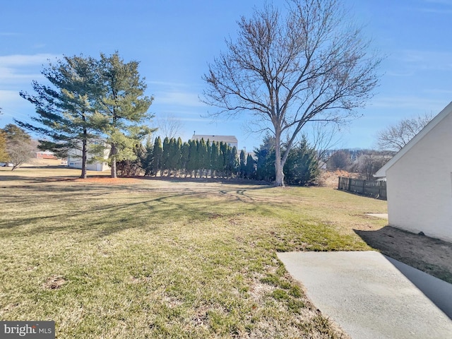 view of yard with fence