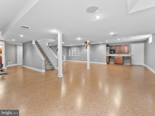 interior space with visible vents, recessed lighting, and baseboards