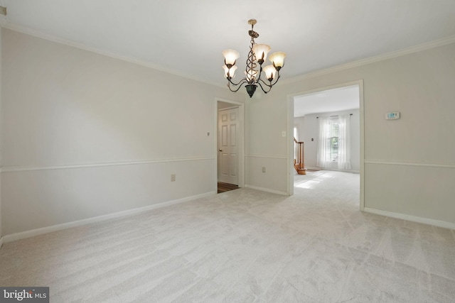 unfurnished room featuring crown molding, baseboards, light colored carpet, and a chandelier
