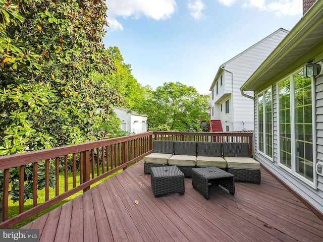 wooden deck with outdoor lounge area