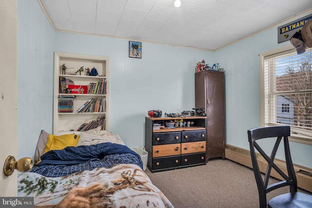 carpeted bedroom featuring crown molding