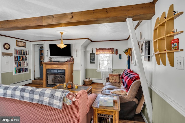 living room with a fireplace, beam ceiling, crown molding, and baseboard heating