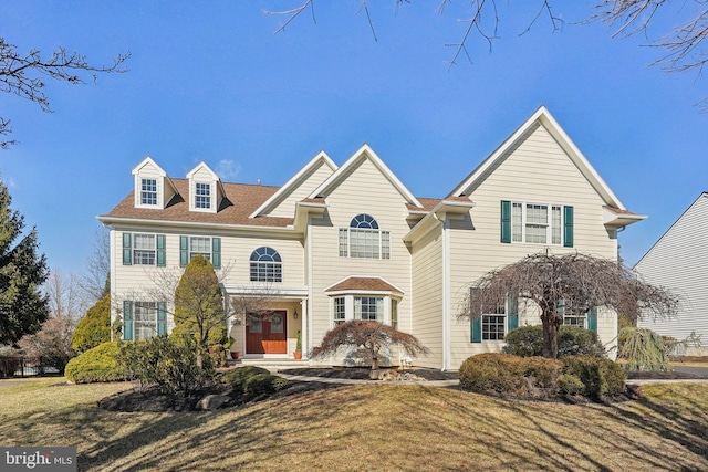 view of front of property with a front lawn